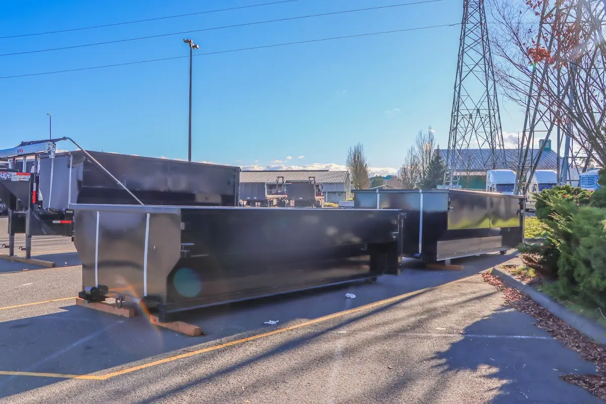 Roll-off dumpster ready for waste disposal at job site for 2 Yard Dumpster Rental in McSwain
